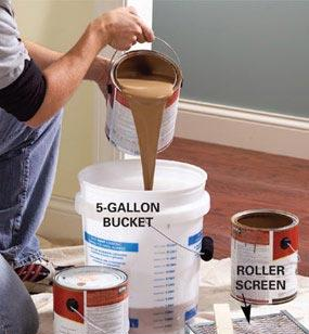 Mix paint in a large bucket